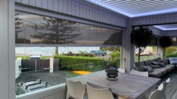 Outdoor blinds on Stanmore Bay home installed by Dynamic Outdoor Solutions